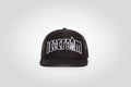 Black cap with Icecream logo on a white background